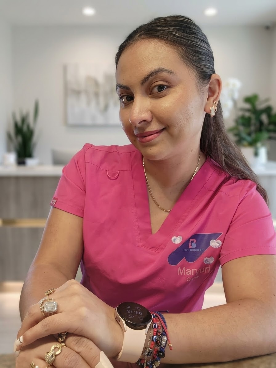 Maryuri Cardenas, owner of Love Bubbles Clean, in her pink company uniform